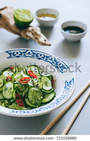 Thai cucumber salad with sesame and chili, dressing for salad, Asian cuisine