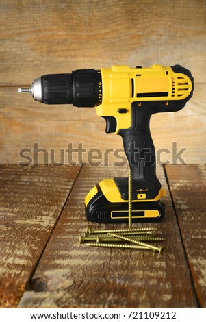 Cordless yellow power drill 