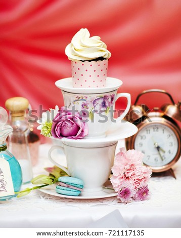 Tea time table with a sweets in Alice in theme 