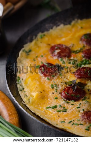 Omelette with sausage, herbs and chive inside, delish and simple
