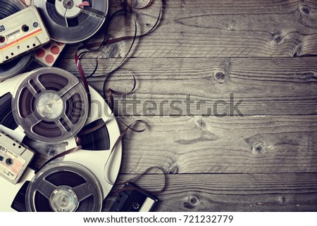 Retro audio reels and cassette tape with copy space Royalty-Free Stock Photo #721232779