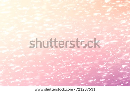 Colorful Abstract Christmas Background with Rays and Golden circle glitter or bokeh lights. Round gold defocused particles