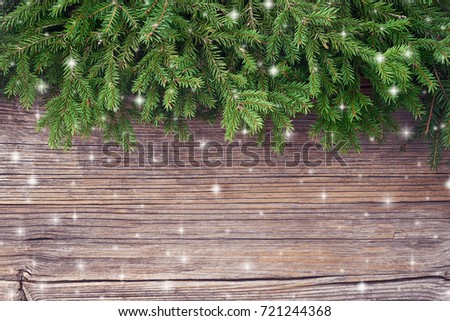  Christmas background. Christmas fir tree on old wooden background. Copy space.                              
