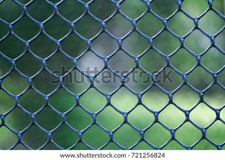 Black plastic mesh and natural background