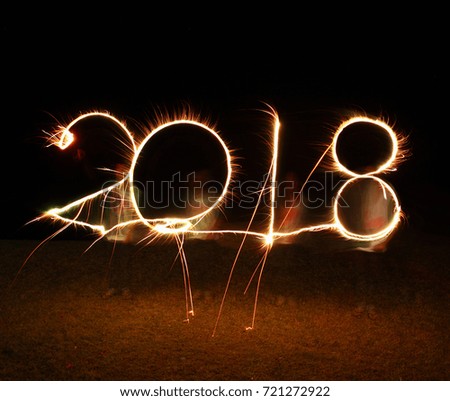 the boy write 2018 happy new year firework sparkle