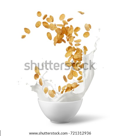 bowl of corn flakes with milk splash isolated on white Royalty-Free Stock Photo #721312936