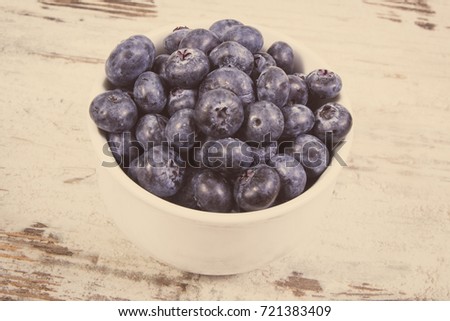 Vintage photo, Fresh ripe blueberries containing natural minerals and vitamin, healthy dessert concept