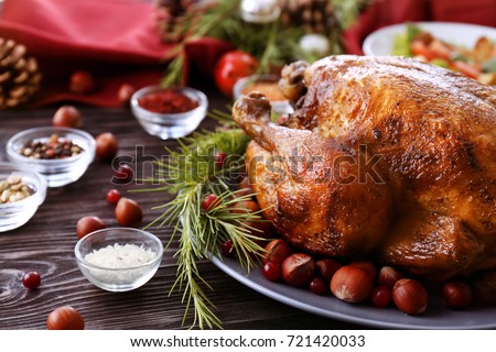 Tasty roasted turkey on plate Royalty-Free Stock Photo #721420033