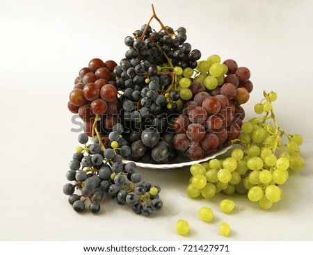  a bunch of grapes or a frame with a photo of the bunch for a micro-stock
