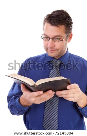 male nerdy geek is reading a book over white background