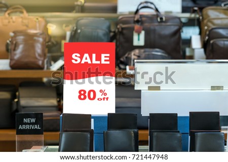 sale 80% off mock up advertise display frame setting over the stack of wallet in the shopping department store for shopping, business fashion and advertisement concept