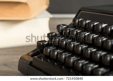 A typewriter and a book
