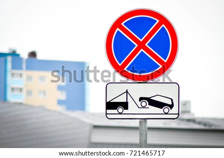 Road signs Parking prohibited and Evacuation of vehicles in the urban background