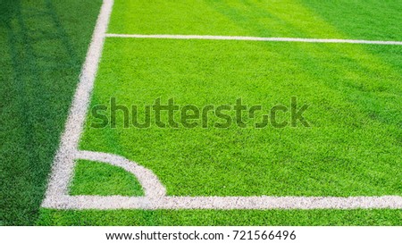 Soccer field grass conner.Beautiful pattern of fresh green grass for football sport, football field,team sport texture.