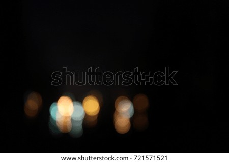 Abstract defocused bokeh lights background with motion