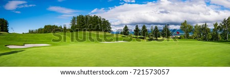 Panorama View of Golf Course with putting green in Hokkaido, Japan. Golf course with a rich green turf beautiful scenery. Royalty-Free Stock Photo #721573057