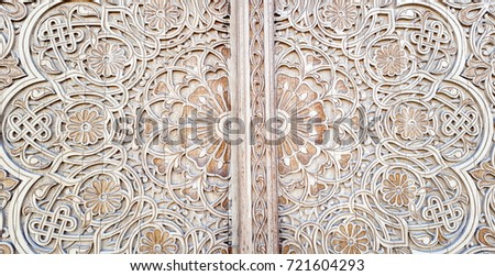 an incredibly beautiful traditional Uzbek floral pattern carved on the door of the mosque