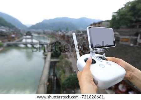  flying drone taking photo of the ancient city in China