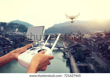flying drone taking photo of the ancient city in China