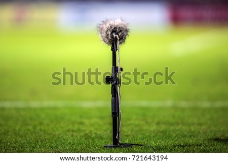 microphone for live sound record and record sound in the football stadium.