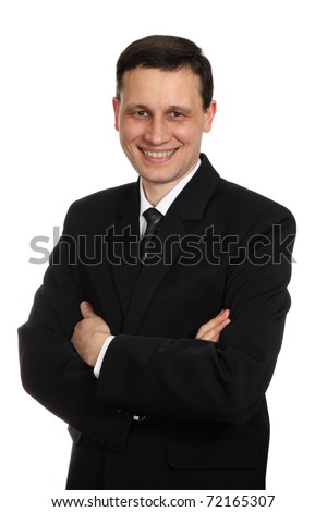 Businessman in black suit, smiling, white background