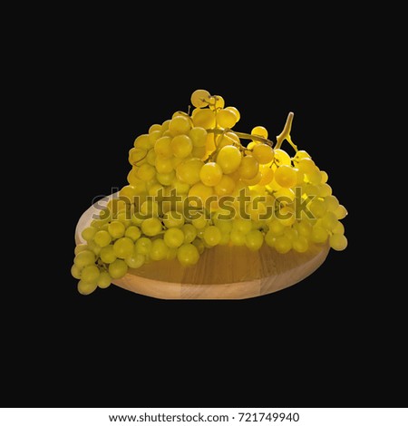 Beautiful large bunch of white grapes lying on a round Board. Isolated on a black background. Copy space.