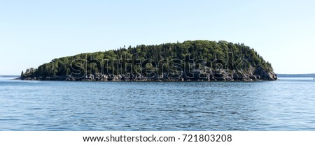 A view of porcupine island in Frenchman's Bay by Bar Harbor Maine.