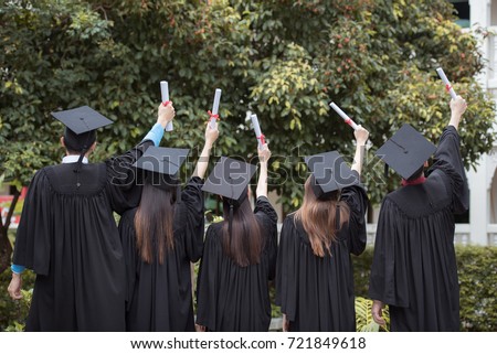 Tuition College Education Learn university -  Young Diverse International Students Celebrating Graduation  Royalty-Free Stock Photo #721849618