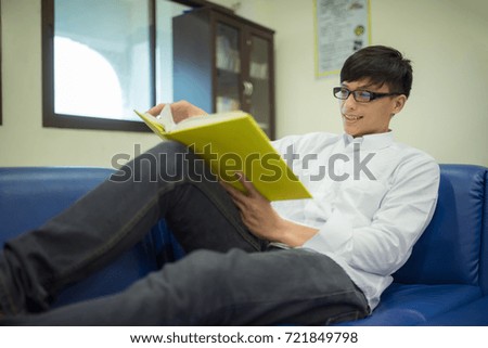  Man High School Student  read a book at Library