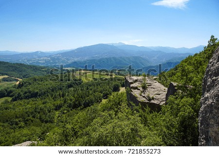 Mountain green valley stream landscape and blue sky