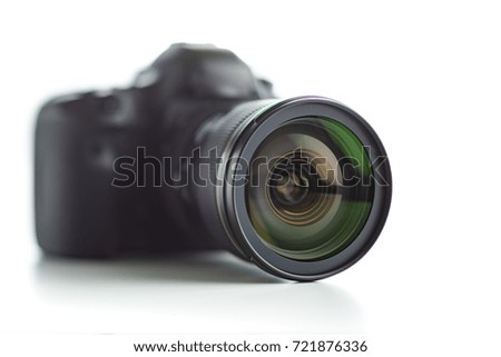 Professional camera with lens isolated on white background.