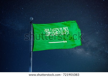 Arabia flag on the mast over milky way
