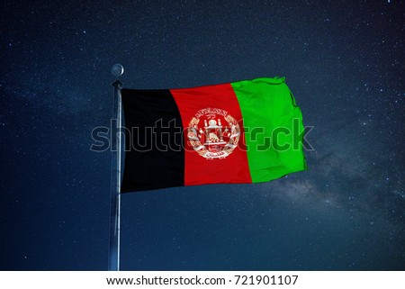 Afganistan flag on the mast over milky way