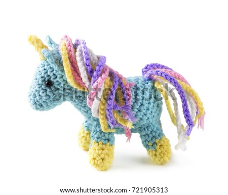 Crocheted amigurumi toy isolated on a white background