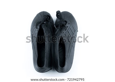 Black full rubber shoes on white isolated background