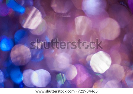 Abstract blue and lilac blurred background with bokeh lights