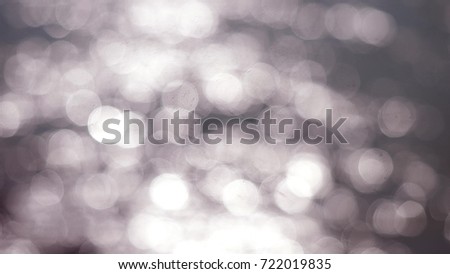 Beautiful silver glittering lights bokeh Christmas background