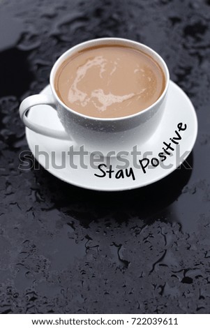 Stay Positive word concept with coffee cup