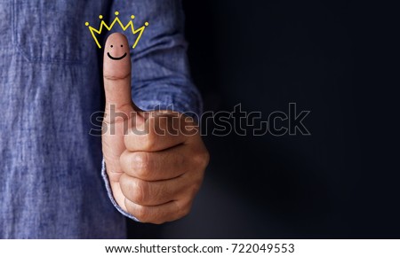 Customer Experience Concept, Best Excellent Services Rating for Satisfaction present by Thumb of Client with Crown and Smiley Face icon Royalty-Free Stock Photo #722049553