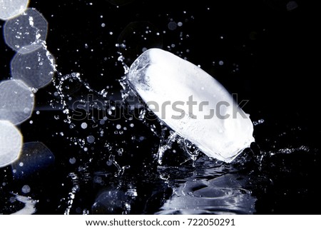 Ice Block / Ice is water frozen into a solid state. Depending on the presence of impurities. it can appear transparent or a more or less opaque bluish-white color.