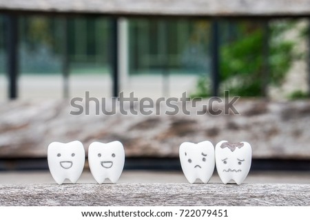 health concept with healthy teeth and decayed teeth