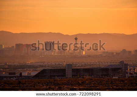 The buildings and casinos on the strip cityscape downtown Las Vegas at sunset