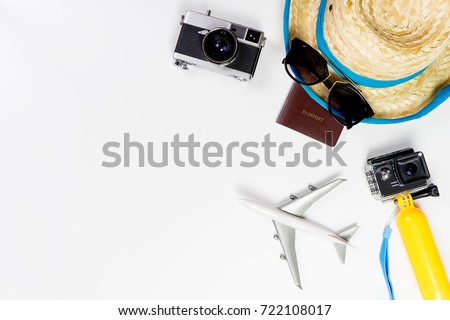 Summer Beach travel objects and gadgets on white background. Beach Vacation holidays travel accessories with copy space for travel banner and poster advertisement. 