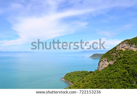 The mountain, calm sea and clear blue sky clouds, photo for background