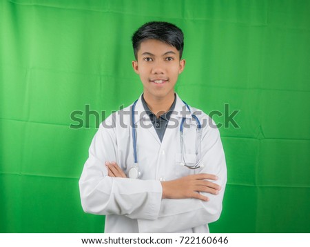 Asian doctor active and professional on green screen background
