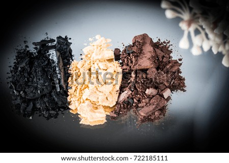 eye shadow in brown, gold and black color./ eye shadows.