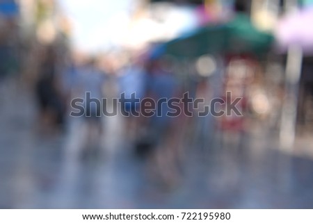 out of focus people walking - blurred background concept
