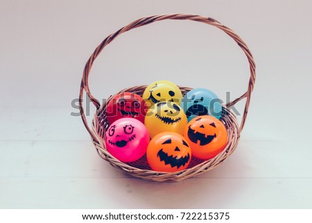 Self Made Hand Drawn Smiley faces Halloween spooky balls in basket