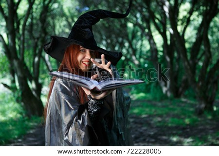 Photo of young laughing witch