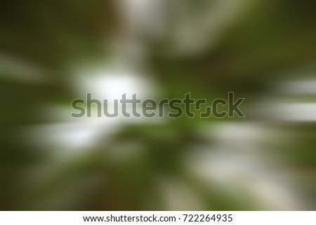Green of dark abstract background with blurred shallow depth of focus